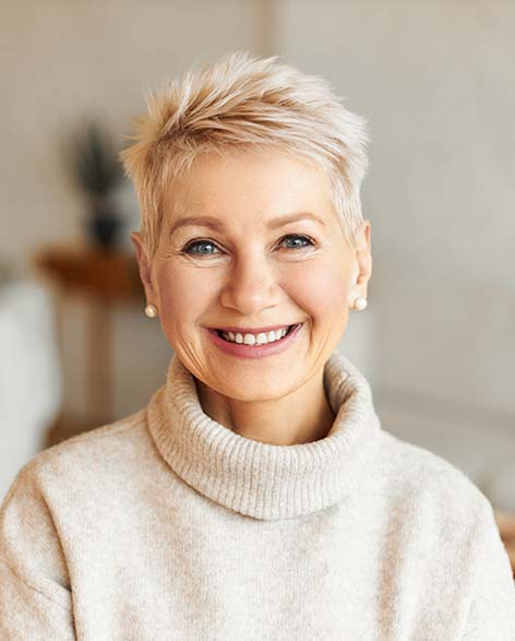 Older woman in sweater
